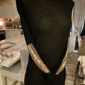 Black sweater with sequin elbow patches